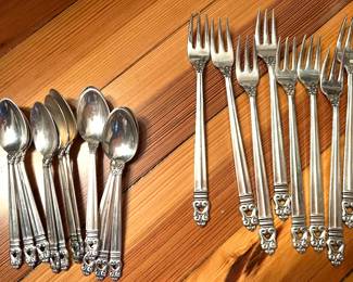 Sterling Silver Flatware 32 dinner knives
50 dessert and/coffee spoons
24
25 salad forks
14 dinner forks
23 bread knives
8 olive forks
12 sugar spoons