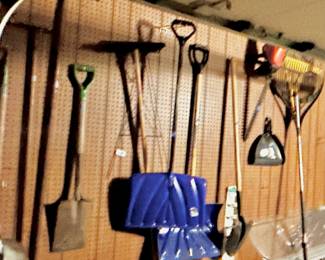 Various large outdoor shovels, brakes brooms