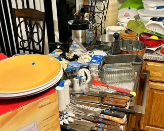 Various cooking utensils, and knives
New inbox Sunbeam toaster oven