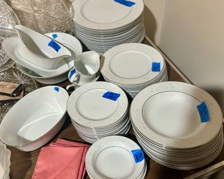 White China with silver trim, and matching serving pieces