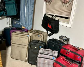Various size suitcases & briefcases