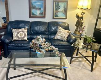 Glue leather sofa. Both ends recline.
Glass top metal leg rectanglecoffee table with 2 matching square End tables