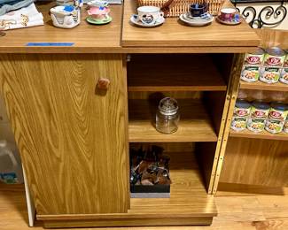 Cabinet with fold out buffet top