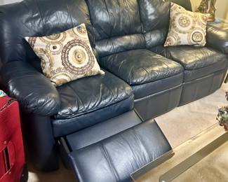 Blue leather sofa. Both ends recline. $200