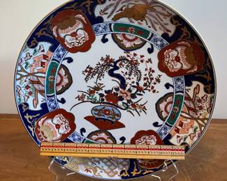 C57 - $55. Vintage Japanese Imari Plate. Measures 15.5" across. 