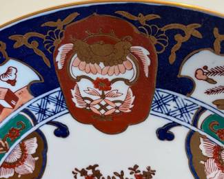 C57 - $55. Vintage Japanese Imari Plate. Measures 15.5" across. 