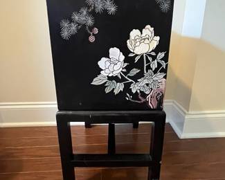 C35 - $125. Black Lacquered Chest on Stand. Cranes on the top and floral pattern around. Measures 16" wide x 11" deep x 23" tall. 3 drawers slide easily. No issues noted. 
