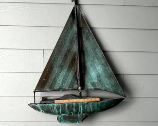 C100 - $150. Decorative Copper Sailboat. Was originally a weather vane - more recently used as wall art. Measures 27" x 38" tall. 