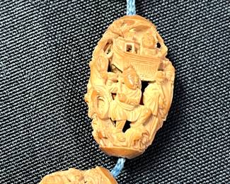 C113 - $2000. 19th Century Chinese Heido Carved Fruit Pits on Bracelet. Qing Dynasty 1850s. 12 Beads. 