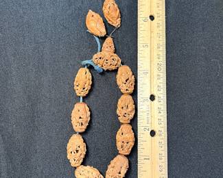 C113 - $2000. 19th Century Chinese Heido Carved Fruit Pits on Bracelet. Qing Dynasty 1850s. 12 Beads. 