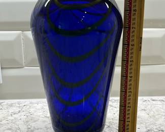C86 - $25. Murano Style Art Glass Vase. Measures 9" tall. Has some scratches. 
