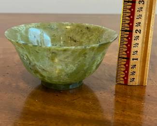 C21 - $25. Vintage Green Chinese Jade Bowl Measures 4" wide x 2" tall (without stand) 4" tall with stand. Has 1 minor crack that is about 1" long - hard to notice but it is there. 
