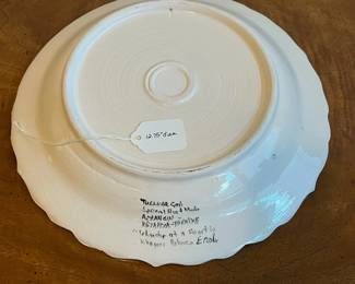 C60 - $30. Vintage Hand Painted Turkish Plate. Signed "Islander at a feast in Khagons Palaces Erol" Measures 12.75" diameter. 
