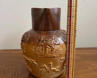 C79 - $40. 19th Century Royal Doulton Lambeth Pitcher. Salt Glazed. Measures 8.5" tall. 1 very minor chip on the top rim. 