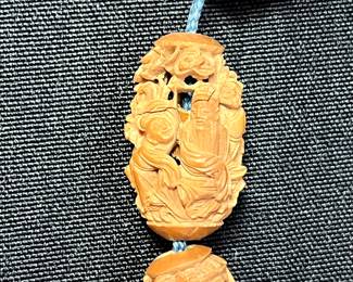 C113 - $2000. 19th Century Chinese Heido Carved Fruit Pits on Bracelet. Qing Dynasty 1850s. 12 Beads. 