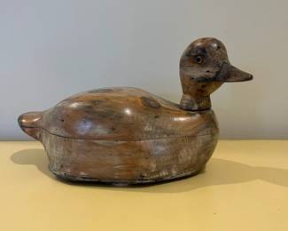 C17 - $125. Unsigned *old* duck decoy with glass eyes and swivel head. Measures 12" x 4.75" wide x 7.25" tall. 