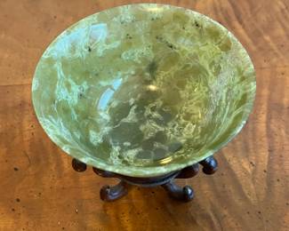 C21 - $25. Vintage Green Chinese Jade Bowl Measures 4" wide x 2" tall (without stand) 4" tall with stand. Has 1 minor crack that is about 1" long - hard to notice but it is there. 