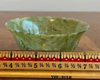 C21 - $25. Vintage Green Chinese Jade Bowl Measures 4" wide x 2" tall (without stand) 4" tall with stand. Has 1 minor crack that is about 1" long - hard to notice but it is there. 