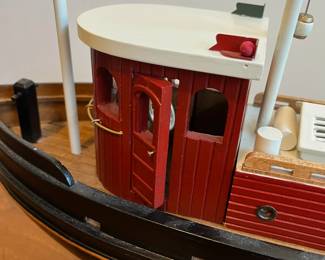 C25 - $30. Decorative Wooden Boat. Measures 20" long x 6" wide x 15" tall. 