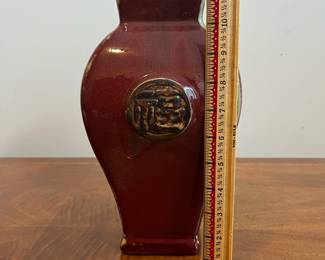 C85 - $25. Decorative Pottery Vase. Measures 11" tall. 