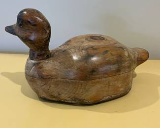 C17 - $125. Unsigned *old* duck decoy with glass eyes and swivel head. Measures 12" x 4.75" wide x 7.25" tall. 