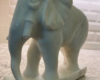C87 - $100. Marble Elephant Statue. Measures 12" long x 4.5" x 12.5" tall. One tusk is broken but HEAVY. 