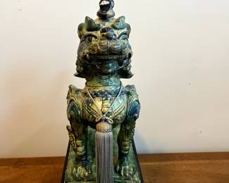 C99 - $350. PAIR of Foo Dogs on Hollow Wooden Stands. Measures 11" x 6" x 19" tall. One "knob/horn" has been repaired. Beautiful colors!
