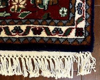 C103 - $275. Wool Rug. Measures 4' x 6'. 100% virgin lamb wool pile. 144 knots per inch. Very good condition! Beautiful bright colors. 