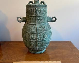 C123 - $250. Bronze Ware lidded vessel. Measures 11" wide x 16" tall. Does have pitting and a few tiny holes. 