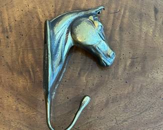 C47 - $18. Brass Horse Hanger. Measures 6" long x 3.25" deep. 