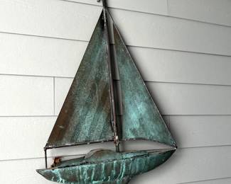 C100 - $150. Decorative Copper Sailboat. Was originally a weather vane - more recently used as wall art. Measures 27" x 38" tall. 