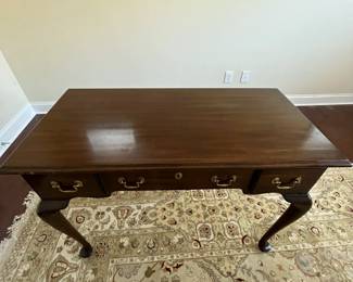 C64 - $500. Henkel-Harris Virginia Galleries Queen Anne Style Desk. Measures 42" wide x 20.5" deep x 30.25" tall. Very good condition. The biggest issue I notice is duct tape reside on the back. 
