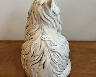 C75 - $35. Porcelain Cat Statue. Measures 14" tall. 