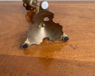 C105 - $18. Single Brass Candleholder. 