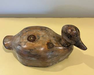 C17 - $125. Unsigned *old* duck decoy with glass eyes and swivel head. Measures 12" x 4.75" wide x 7.25" tall. 