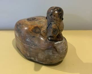 C17 - $125. Unsigned *old* duck decoy with glass eyes and swivel head. Measures 12" x 4.75" wide x 7.25" tall. 
