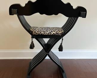 C6 - $175. Savonarola Folding Chair. Measures 24" wide x 19" deep x 32.5" tall. (Leopard Cushion is removable) Nice lacquered black finish. 