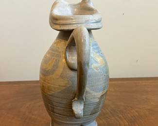 C40 - $25. Heavy Pottery Pitcher. Measures 10.25" tall. 