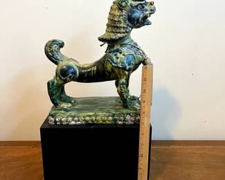 C99 - $350. PAIR of Foo Dogs on Hollow Wooden Stands. Measures 11" x 6" x 19" tall. One "knob/horn" has been repaired. Beautiful colors!