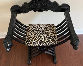 C6 - $175. Savonarola Folding Chair. Measures 24" wide x 19" deep x 32.5" tall. (Leopard Cushion is removable) Nice lacquered black finish. 