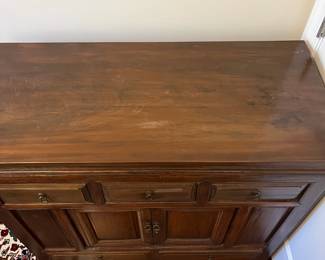 C16 - $225. Asian Antique Cabinet. Solid wood - very light to move. Has 5 Drawers - 1 Middle Cabinet with 2 doors. Measures 38.25" x 17.5" deep x 35.5" tall. Versatile piece for TV or storage!