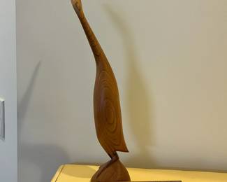 C106 - $50. Teak Wood Carved Crane. (Signed but not legible.) Measures 3.75" x 2.75" x 18.25" tall. 