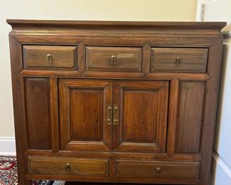 C16 - $225. Asian Antique Cabinet. Solid wood - very light to move. Has 5 Drawers - 1 Middle Cabinet with 2 doors. Measures 38.25" x 17.5" deep x 35.5" tall. Versatile piece for TV or storage!