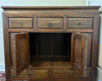 C16 - $225. Asian Antique Cabinet. Solid wood - very light to move. Has 5 Drawers - 1 Middle Cabinet with 2 doors. Measures 38.25" x 17.5" deep x 35.5" tall. Versatile piece for TV or storage!