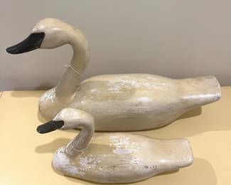 C96 - $275 PAIR of Decorative Swan Decoys. Wooden - Unsigned. Largest is 19.75" long x 11.5" tall. Smaller is 12.25" long x 7.75" tall. 