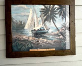 C101 - $25. Sailboat Print. Measures 33" x 27".  Has been used on a covered porch and one side of the frame has some weathering. 