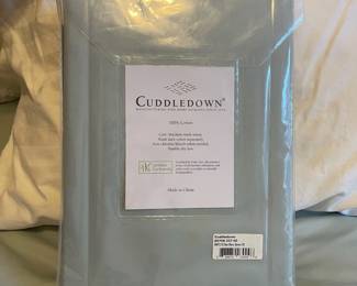 C128 - $70. Cuddledown Duvet Cover. New in Package. QUEEN size. 