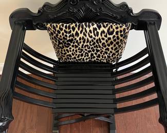C6 - $175. Savonarola Folding Chair. Measures 24" wide x 19" deep x 32.5" tall. (Leopard Cushion is removable) Nice lacquered black finish. 
