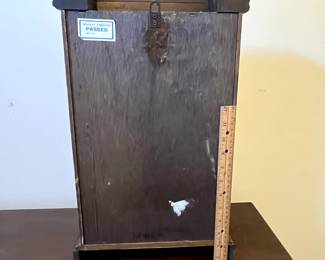 C102 - $40. Regulator Clock. Measures 12.5" wide x 5.25" deep x 19" tall. Has key and pendulum inside. Works!