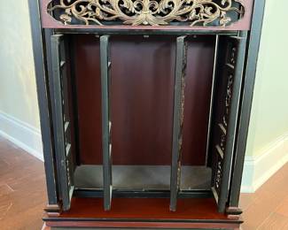 C49 - $150. Small 4 door Asian Cabinet. Lacquered Finish black & red. Measures 21" wide x 12.75" deep x 27.5" tall. 